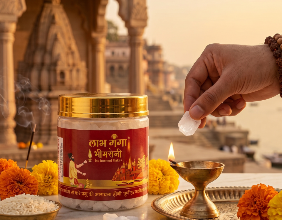 Hand placing camphor in diya beside Labh Ganga Bhimseni camphor jar in a pooja setup.